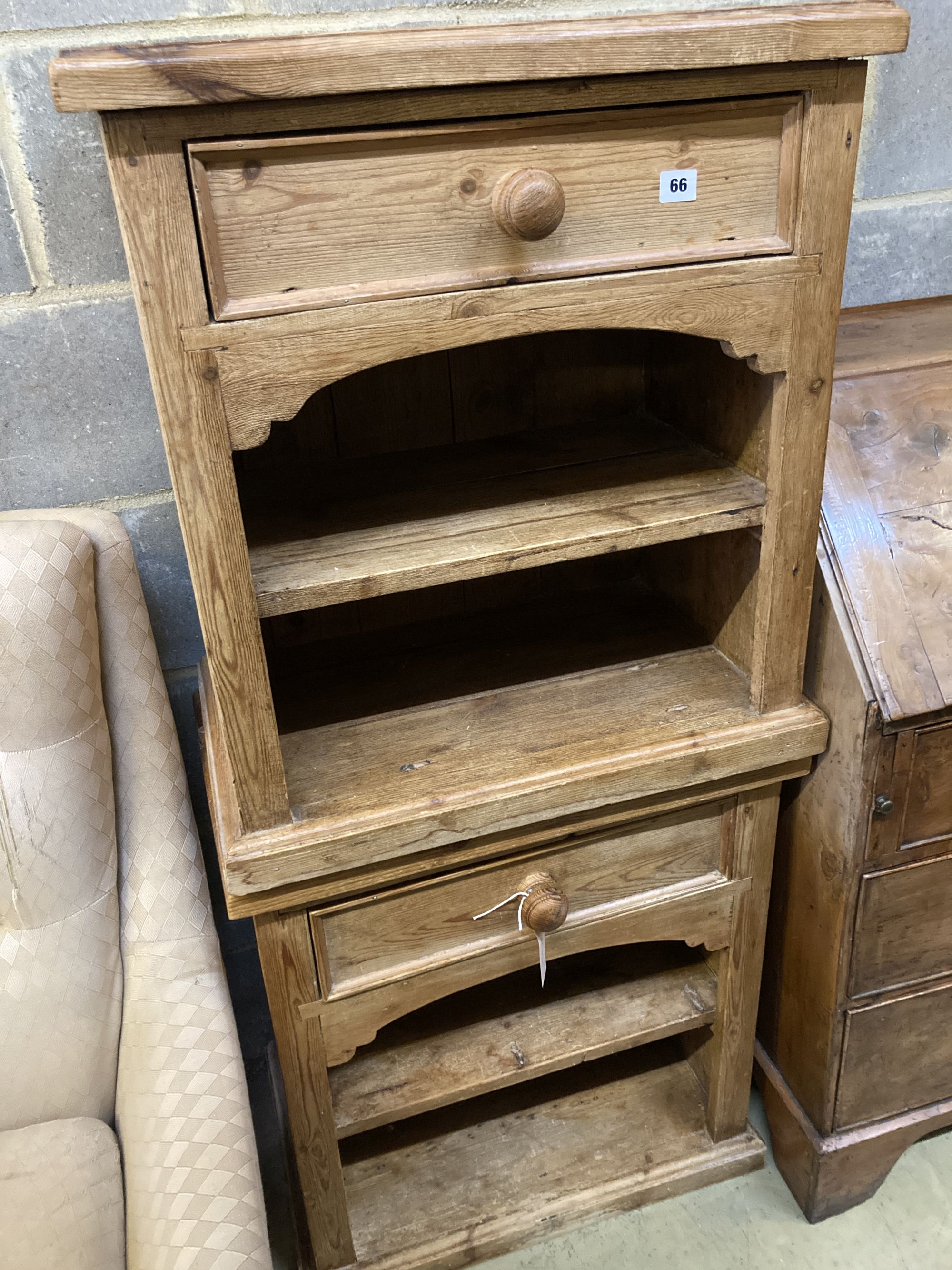 A pair of pine bedside cupboards, width 60cm, depth 38cm, height 67cm